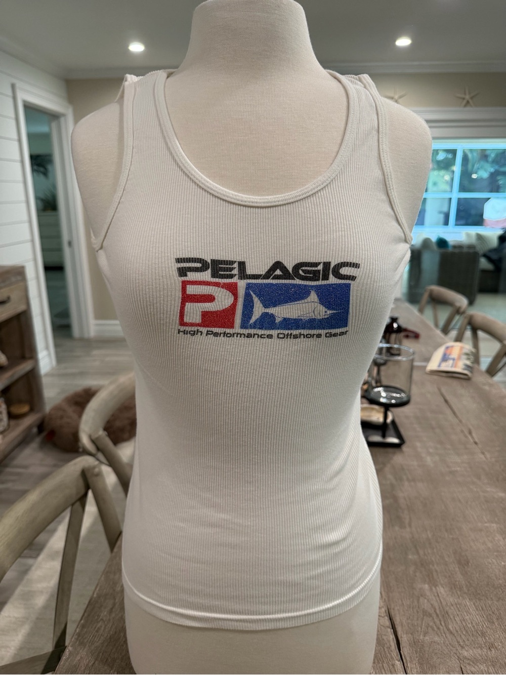 Pelagic White Ribbed Tank Top with Red and Blue Logo